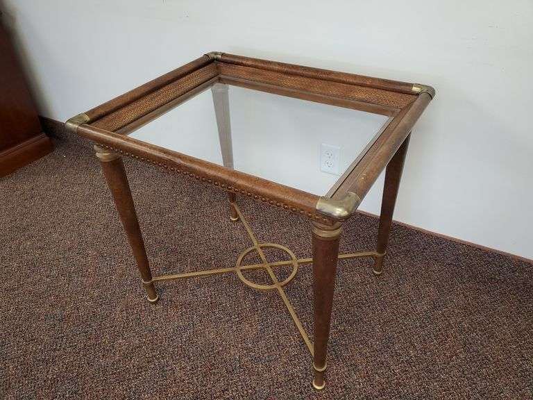 1980s Modern Regency Brass & Glass Side Table Features burlwood finish, brass corner accents, beveled edged glass top. Measures 28 in W X 23 in D X 26 in H. See photos.