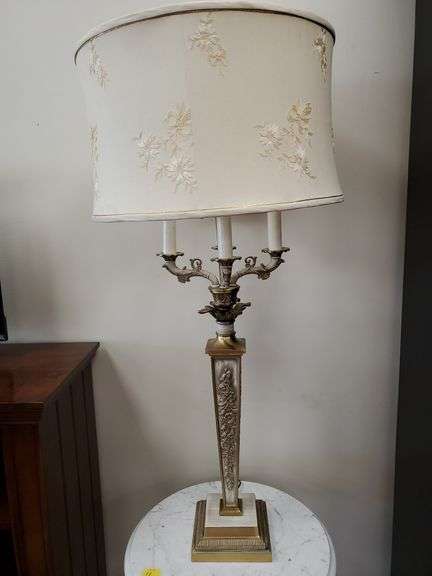 Vintage brass candelabra lamp with floral design stands 43inches tall and features a cloth shade with embroidered flowers and gold trim.