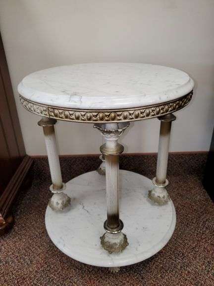 Italian made marble accent table with metal supporting columns measures 18 in round X 21 inches tall