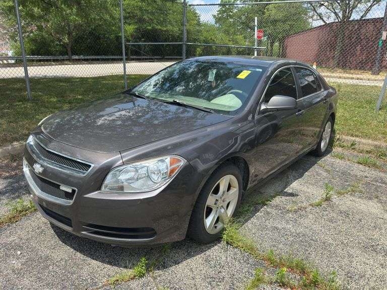 2011 Chevy Malibu 4 door sedan, VIN: 1G1ZA5EU8BF339269. Has key. Battery is dead. Odometer is 142,226 according to the City. Located at Back side of Fire Dept.: 420 Martin Luther King Jr Blvd, Youngstown, OH 445