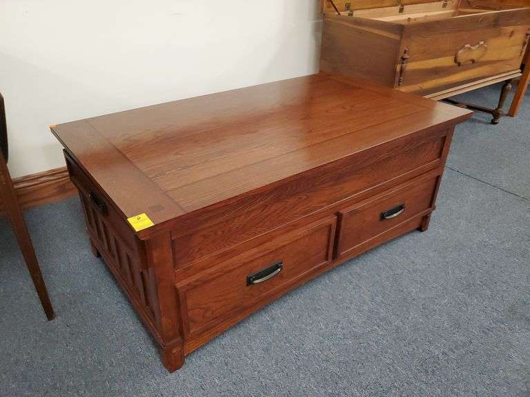 Signature Design by Ashley Cross Island Lift Top Coffee Table. With 2 Front and 2 Side Drawers measuring 47"W x 26"D x 19"H with top down.