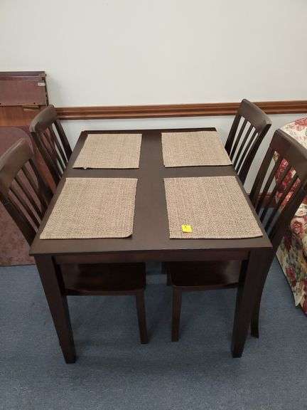5 pc Dining Table and (4) Chairs Set in a Dark Finish Measuring 36"W x 48"L and includes placemats. Marked made in Vietnam