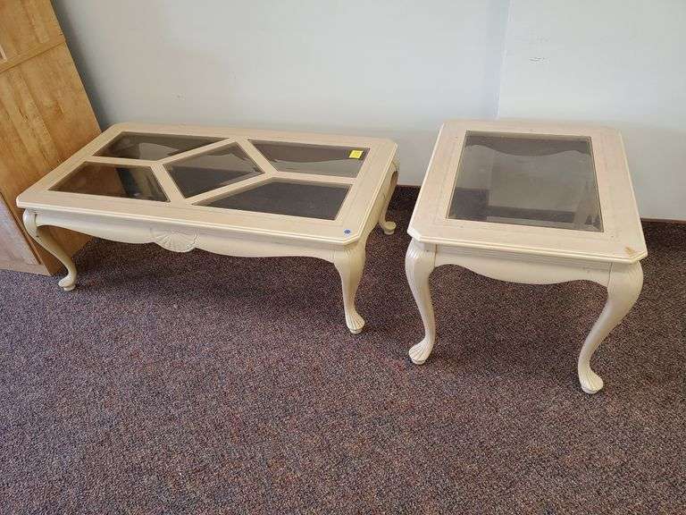 Queen style bevel edged coffee table measures 48 in WX24 in DX16 in H, matching end table measures 27 in x 22-in x20 inch.