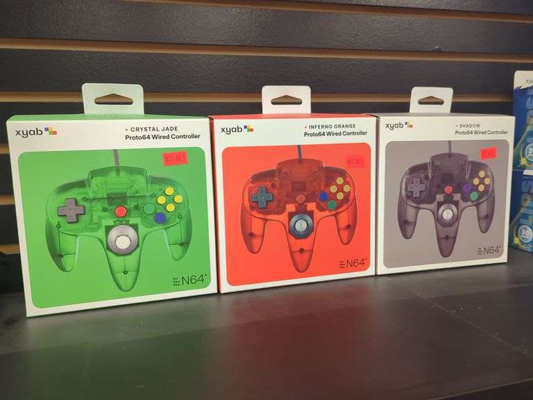 Xyab proto 64 wire d controller for N64 in Crystal Jade, inferno, orange and Shadow. X3