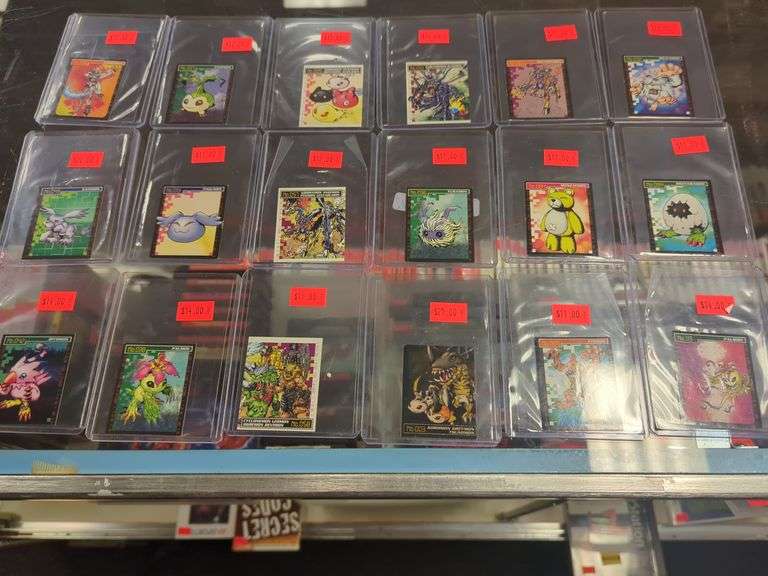 Group of 18 individual Digimon cards in protective sleeves. All 18 for your bid!