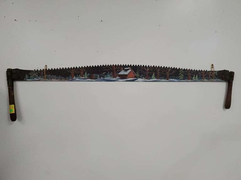 Vintage two man saw with painted maple syrup making scene signed by artist. Measures 56 in wide.
