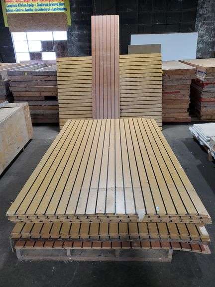 Slat wall panels(9) sheets measuring 5 ft wide by 8 ft tall in light in medium finish, smaller scraps. Tow motor available to load onto trailer.