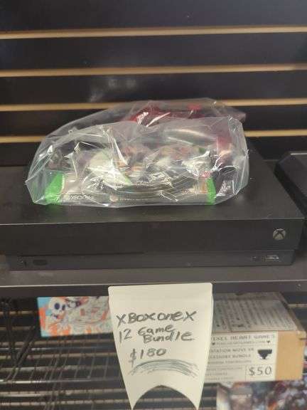 Xbox One 12 game bundle with one controller and power cord. Untested. Inspect at preview