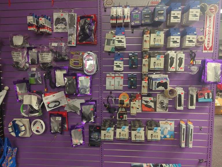 Entire wall of video game console, accessories and supplies for Xbox 360, Sony PlayStation, Wii, and more. See all photos!