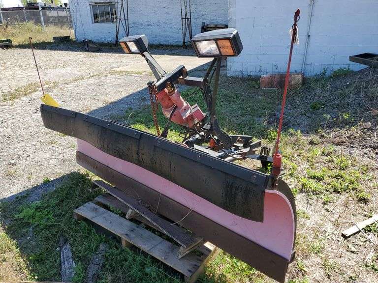 Western hydraulic UniMount snow plow with lights and a 90" wide poly blade. See photos. Inspect at preview. Tow motor available to load on to trailer.