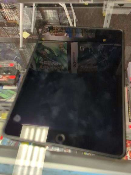 Touch screen tablet in Speck protective case. Power's on but needs charged. May need a password. Inspect at preview