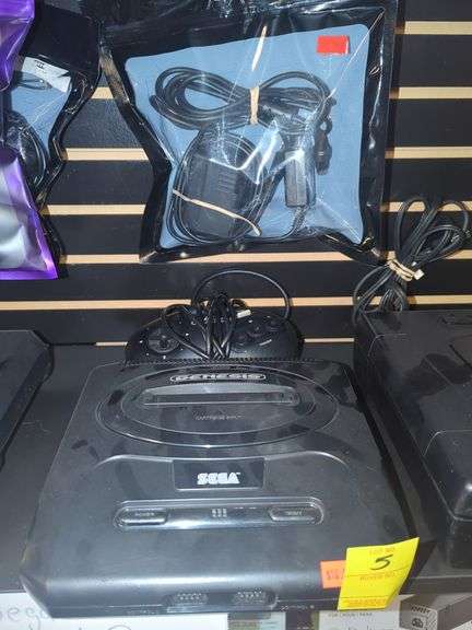 Sega Genesis model 2, untested. Includes power supply controller and AV cable.
