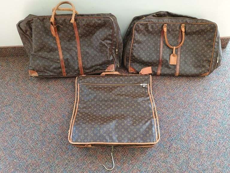 (3) used Louis Vuitton travel bags. See photos. Seller guaranties that they are really Louis Vuitton originals. Inspect at preview.