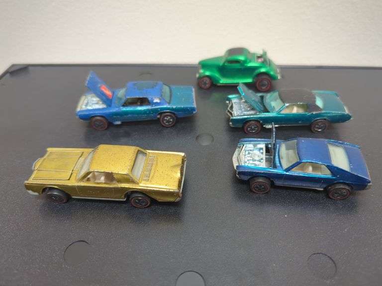 Hot Wheels redline including custom AMX, custom Continental Mark 3, custom El Dorado, custom T-Bird, classic Ford coupe. All five for your bid