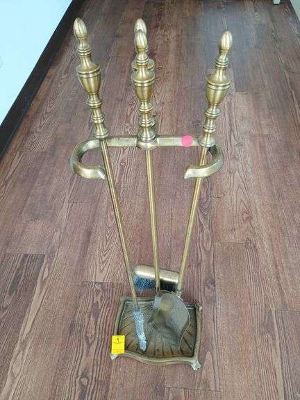 Solid brass fireplace tool set includes brush, scoop, poker.