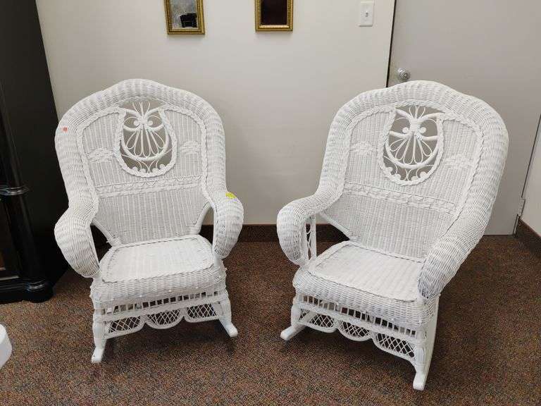 Matching pair of white painted wicker rocking chairs.  Appears to have been kept inside or lightly used