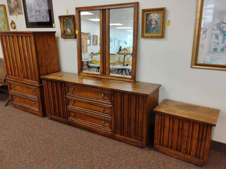 Mid-century 3-piece bedroom set featuring dresser with double mirror, Chest of drawers and nightstand. Set has lots of storage. Dresser measures 73in. W X 18.5in. D x 72 in. H with attached mirror. Tall dresser measures 39.5in. H x by18.5 in. W x 58 1/4 in. H.