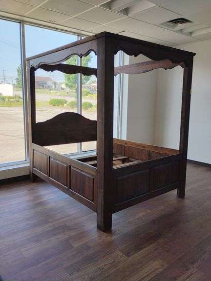 Vintage dark pine finish French, Queen size, 4 post canopy bed with ornate scalloped features and matching 3 step stool. Bed measures 64 inches wide x 84 inches long x 84 inches high. Purchased in 1976 from Strauss Hershberg along with a whole house of matching Bernhardt furniture with the same pine wood and decorations.