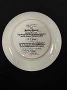 1 - ‘Holiday Skaters’ fine bone china plate by Lloyd Garrison, 19807(imperfection on right side).