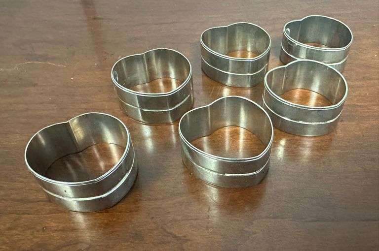 Six Silver-plated Napkin Rings