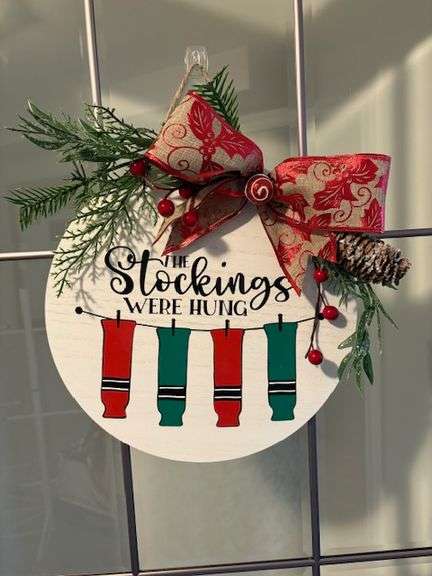 Wooden Christmas door hanger. Hockey sock themed