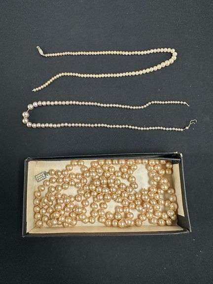 Damaged Pearl Necklaces