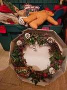 Bin with Christmas Decor Santa Wreath Throws