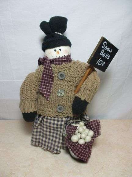 This is a handmade snowman doll, likely used as a primitive country-style Christmas or winter decora