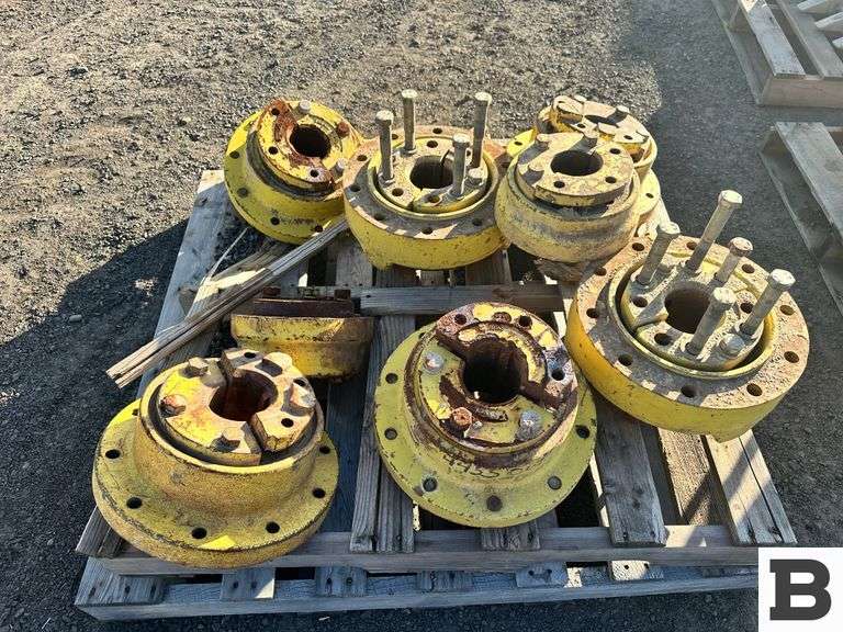 Rustic Tractor Hub (8) Tractor Hubs - Booker Auction Company