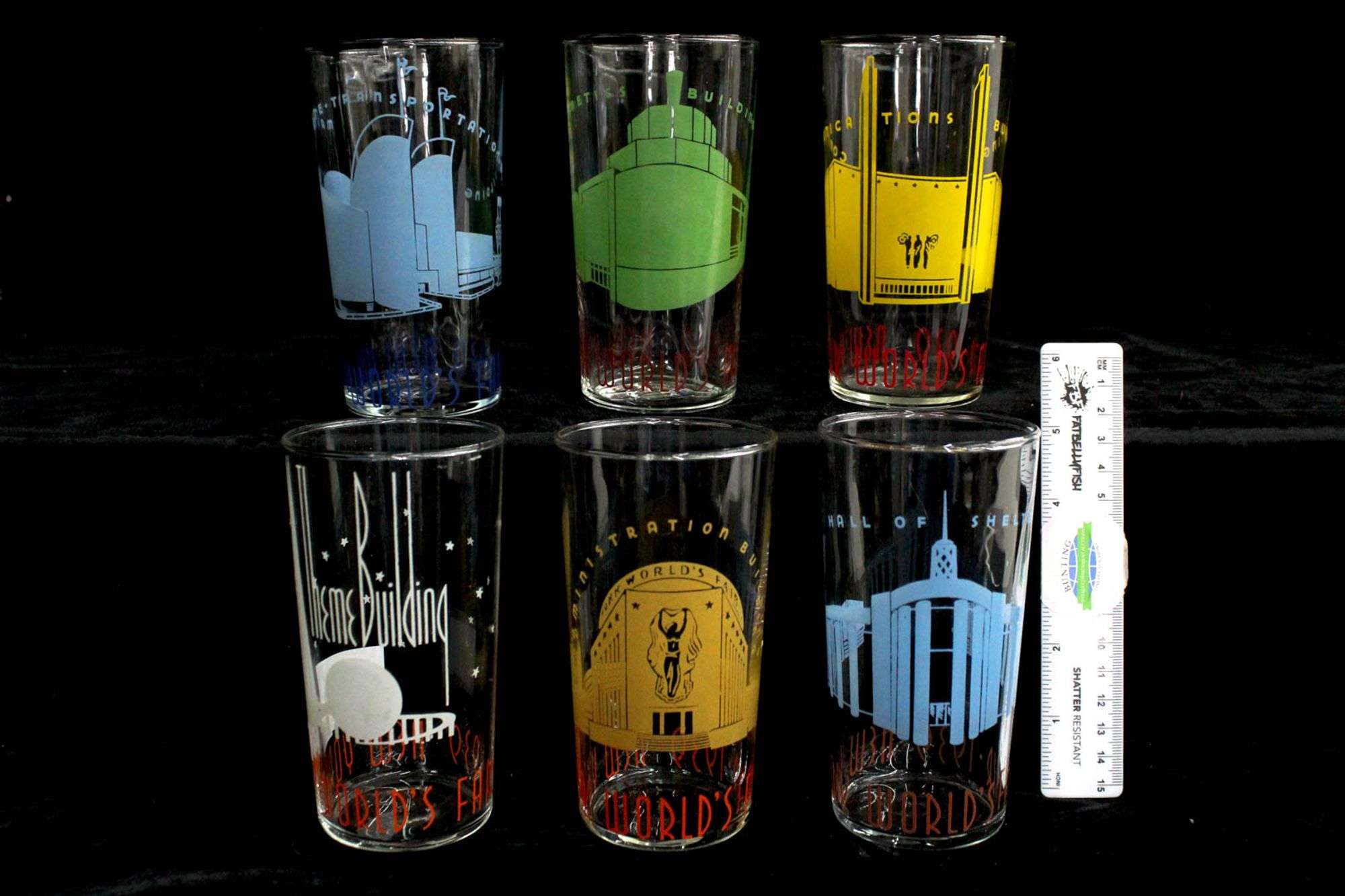 Vintage 1939 World's Fair Souvenir Drinking Glasses. Set of Six. Items  include Theme Building, Administration Building, Marine Transportation  Building, Communication Building, Cosmetics Building, and Hall of Shelter.  Description per Consignor ...