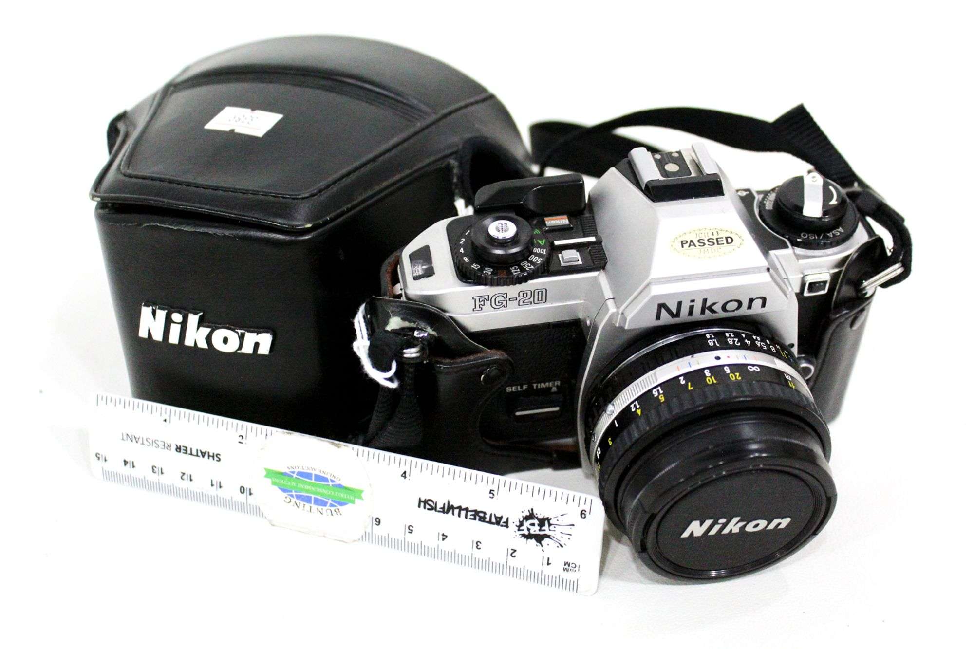 Nikon FG-20 35 mm Film SLR Camera with Case - Bunting Online Auctions