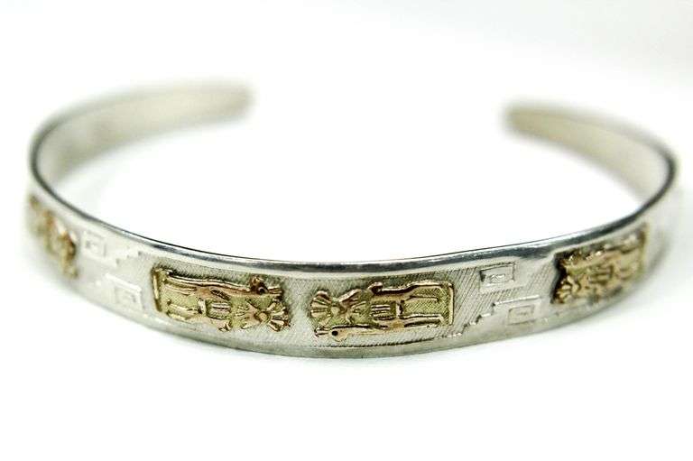 18 KT Gold trim on an 850 Silver Cuff Bracelet Bunting Online Auctions