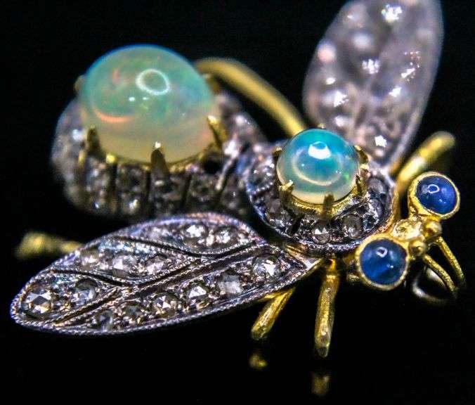1.2 Cts of Diamonds (tested), Opals, Sapphire (tested), and Sterling Silver Fly Brooch.  Wings and head move- gorgeous!