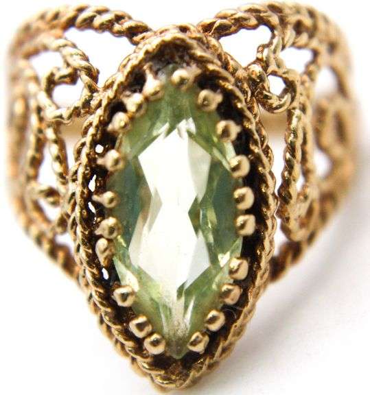 14 KT Gold open work Ring set with a marquise Prasiolite, size 7, in a gift box.