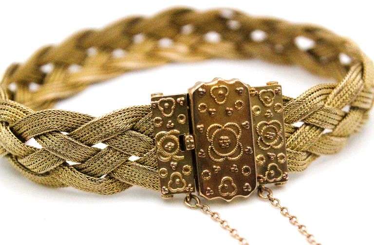 14 KT Gold woven Bracelet with an intricate clasp with a safety chain.   (22.3 gm)