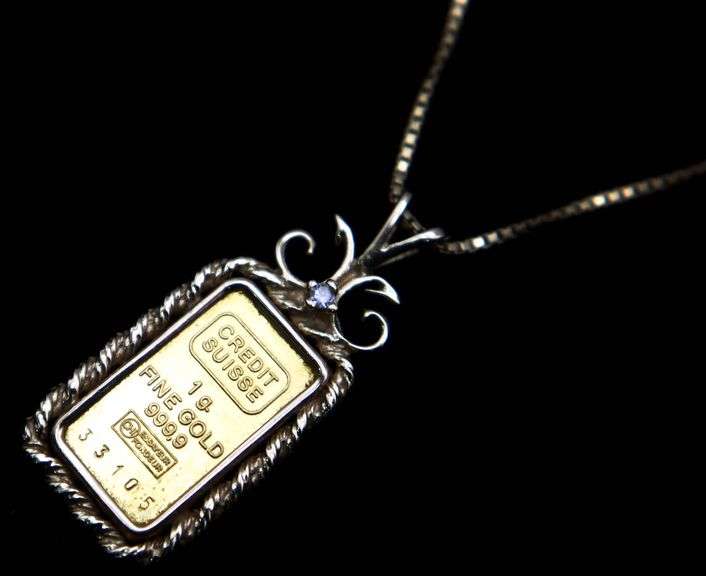 24 KT Gold Pendant (1.0gm) framed in 14 KT Gold on and 18KT Gold 16 " Necklace.    (5.0 gm t.wt)