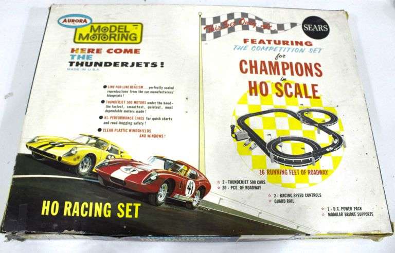 Aurora Model mortoring Thunderjet Champions in HO Scale , Model slot car racing set , Includes 4 early DC Thunderjet cars ( Mako Shark , Dino Ferrari , Ford J  ) and a rare " Hop Up" set with box