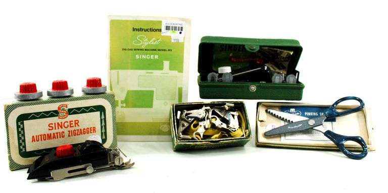Singer Sewing Machine- Accessories for vintage Singer Sewing Machine, including Zig-Zag instruction manual, Automatic Zig-Zagger, Pinking Shears, and attachments.