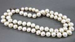 Sterling Silver findings on a knotted genuine Pearl Necklace, 18"