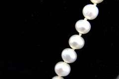 Sterling Silver findings on a knotted genuine Pearl Necklace, 18"