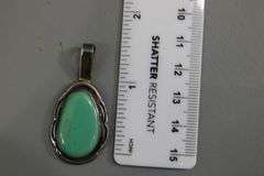 Sterling Silver Native American Turquoise Pendant signed "P".