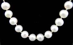 Sterling Silver findings on a knotted genuine Pearl Necklace, 18"