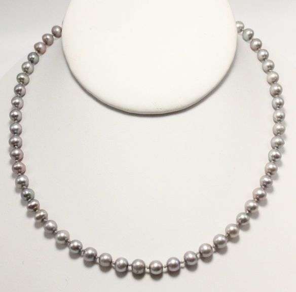 Sterling Silver findings on a genuine, knotted, Pearl Necklace,  16"