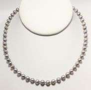 Sterling Silver findings on a genuine, knotted, Pearl Necklace,  16"