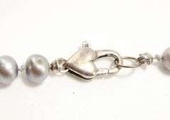 Sterling Silver findings on a genuine, knotted, Pearl Necklace,  16"