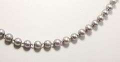 Sterling Silver findings on a genuine, knotted, Pearl Necklace,  16"