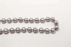 Sterling Silver findings on a genuine, knotted, Pearl Necklace,  16"