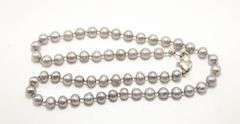 Sterling Silver findings on a genuine, knotted, Pearl Necklace,  16"