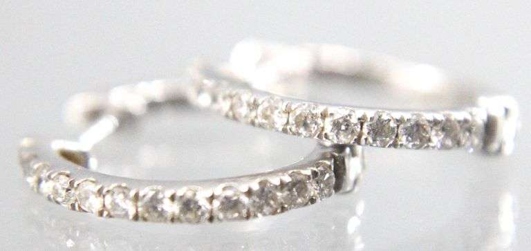 14 KT white Gold Diamond (tested) huggie hoop Earrings.