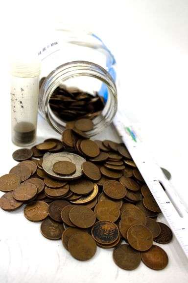 300 Wheat Pennies, three 1976 Eisenhower Dollars, 4 "gold" dollars , 2 Susan B Anthony dollars and more a